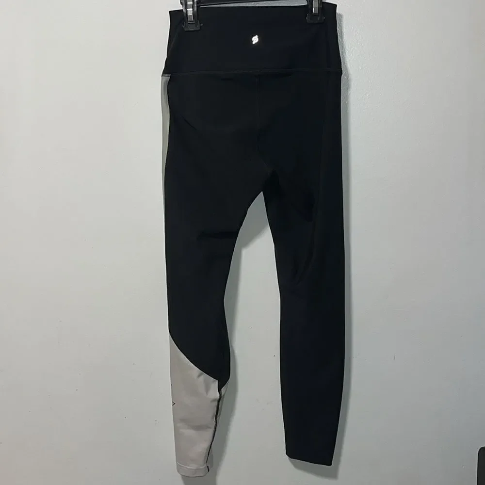 EXCELLENT CONDITION WOMEN’S SIZE MEDIUM PELOTON SHOW UP LOGO LEGGINGS